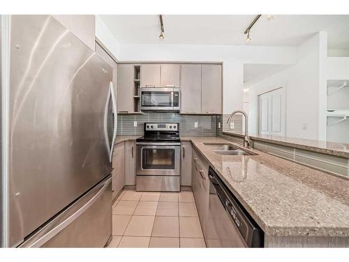 2104-175 Silverado Boulevard Sw, Calgary, AB - Indoor Photo Showing Kitchen With Stainless Steel Kitchen With Double Sink