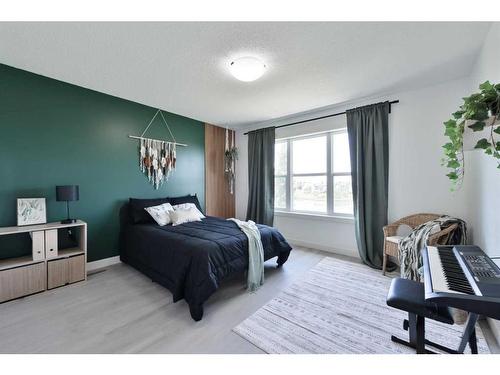 312 Copperpond Circle Se, Calgary, AB - Indoor Photo Showing Bedroom