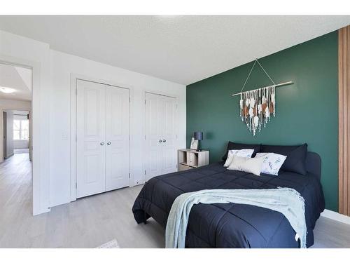 312 Copperpond Circle Se, Calgary, AB - Indoor Photo Showing Bedroom