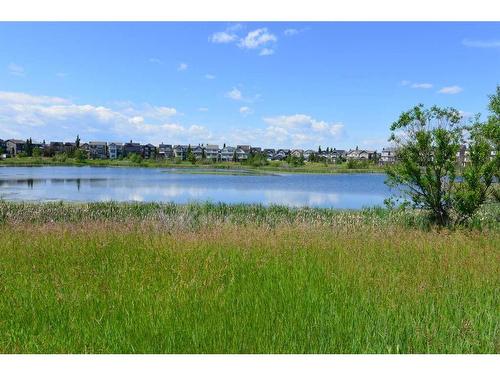 312 Copperpond Circle Se, Calgary, AB - Outdoor With Body Of Water With View