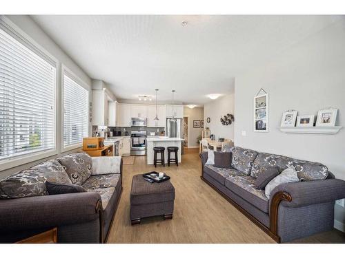 3301-522 Cranford Drive Se, Calgary, AB - Indoor Photo Showing Living Room