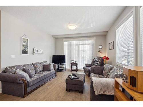 3301-522 Cranford Drive Se, Calgary, AB - Indoor Photo Showing Living Room