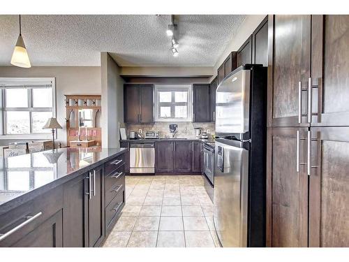 318-88 Arbour Lake Road Nw, Calgary, AB - Indoor Photo Showing Kitchen With Upgraded Kitchen
