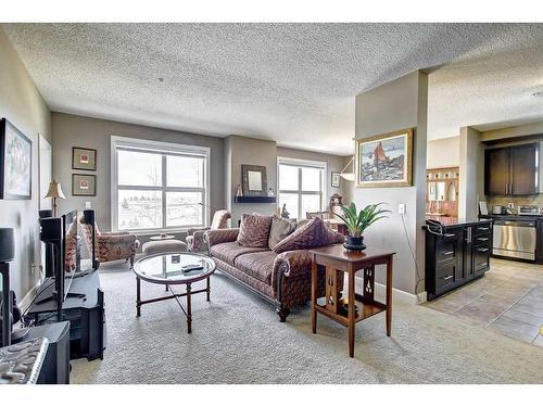 318-88 Arbour Lake Road Nw, Calgary, AB - Indoor Photo Showing Living Room
