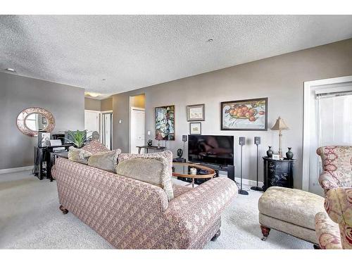 318-88 Arbour Lake Road Nw, Calgary, AB - Indoor Photo Showing Living Room