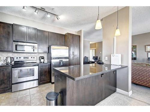 318-88 Arbour Lake Road Nw, Calgary, AB - Indoor Photo Showing Kitchen With Stainless Steel Kitchen With Upgraded Kitchen