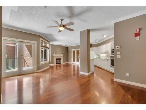 210-59 22 Avenue Sw, Calgary, AB - Indoor With Fireplace
