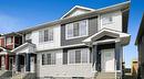 233 & 237, 225 & 229 Creekside Drive Sw, Calgary, AB  - Outdoor With Facade 