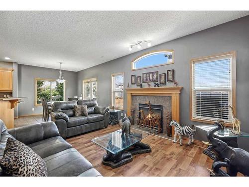 56 Covepark Mews Ne, Calgary, AB - Indoor Photo Showing Living Room With Fireplace