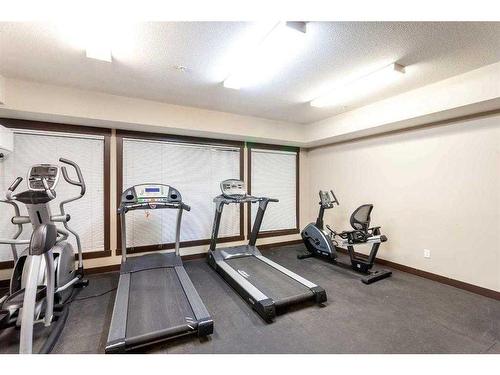 121-Aspenmont Heights Sw, Calgary, AB - Indoor Photo Showing Gym Room