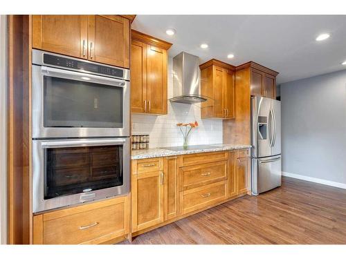 711 Parkwood Way Se, Calgary, AB - Indoor Photo Showing Kitchen With Stainless Steel Kitchen