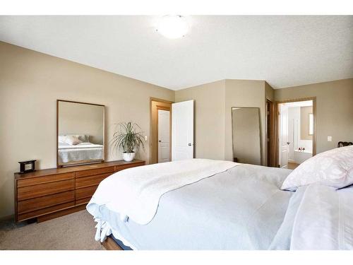 438 Silverado Boulevard Sw, Calgary, AB - Indoor Photo Showing Bedroom