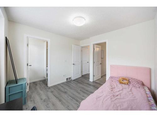 260 New Brighton Row Se, Calgary, AB - Indoor Photo Showing Bedroom