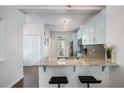 260 New Brighton Row Se, Calgary, AB - Indoor Photo Showing Kitchen With Double Sink With Upgraded Kitchen