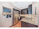 72 Somervale Park Sw, Calgary, AB  - Indoor Photo Showing Kitchen With Stainless Steel Kitchen With Double Sink 