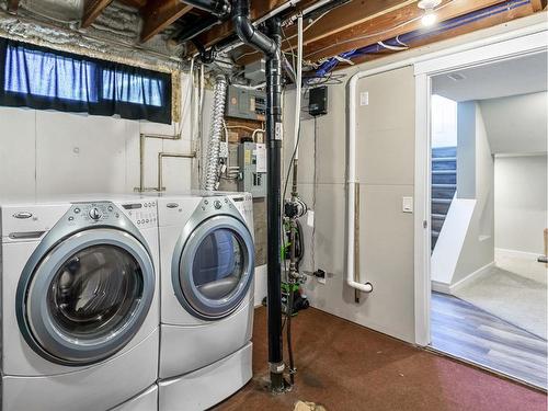 611 Markerville Road Ne, Calgary, AB - Indoor Photo Showing Laundry Room