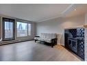 703-1225 15 Avenue Sw, Calgary, AB  - Indoor With Fireplace 
