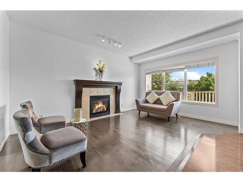 101 Covepark Crescent Ne, Calgary, AB - Indoor Photo Showing Living Room With Fireplace