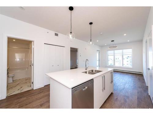 2413-681 Savanna Blvd Ne, Calgary, AB - Indoor Photo Showing Kitchen With Double Sink