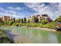 410-208 Holy Cross Sw, Calgary, AB  - Outdoor With Body Of Water With View 