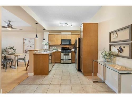 410-208 Holy Cross Sw, Calgary, AB - Indoor Photo Showing Kitchen