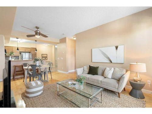 410-208 Holy Cross Sw, Calgary, AB - Indoor Photo Showing Living Room