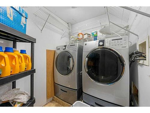 338 Elgin Point Se, Calgary, AB - Indoor Photo Showing Laundry Room