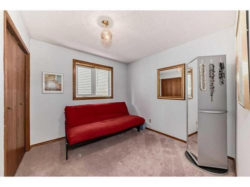 84 Deersaxon Circle Se, Calgary, AB - Indoor Photo Showing Other Room