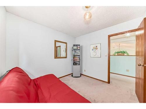 84 Deersaxon Circle Se, Calgary, AB - Indoor Photo Showing Bedroom