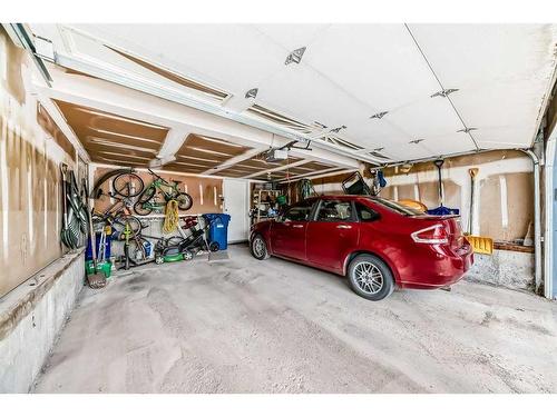 84 Deersaxon Circle Se, Calgary, AB - Indoor Photo Showing Garage