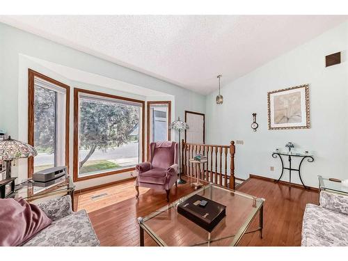 84 Deersaxon Circle Se, Calgary, AB - Indoor Photo Showing Living Room