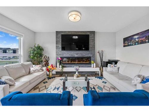 99 Cornerstone Road Ne, Calgary, AB - Indoor Photo Showing Living Room With Fireplace
