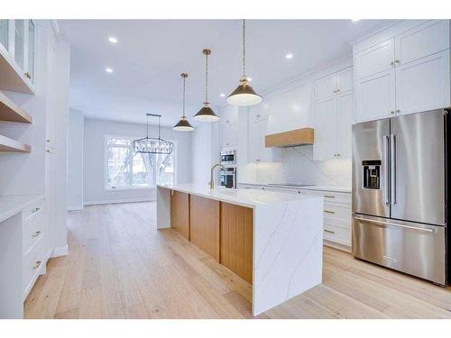 1215 Regal Crescent Ne, Calgary, AB - Indoor Photo Showing Kitchen With Stainless Steel Kitchen With Upgraded Kitchen