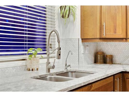 99 Mt Robson Circle Se, Calgary, AB - Indoor Photo Showing Kitchen With Double Sink