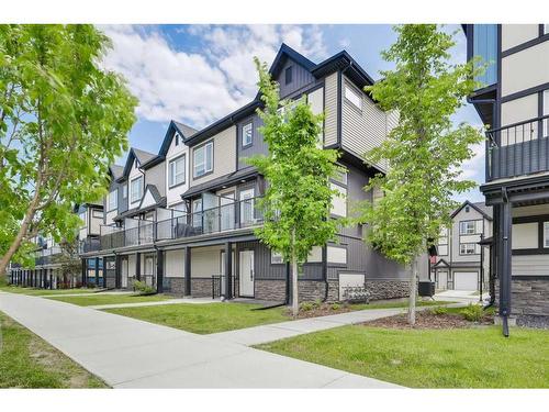 884 Belmont Drive Sw, Calgary, AB - Outdoor With Balcony With Facade