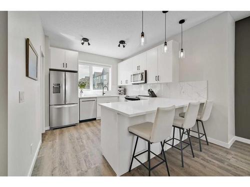 884 Belmont Drive Sw, Calgary, AB - Indoor Photo Showing Kitchen With Stainless Steel Kitchen With Upgraded Kitchen