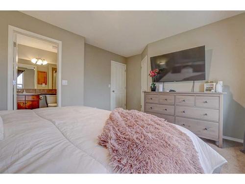 183 Cranberry Way Se, Calgary, AB - Indoor Photo Showing Bedroom