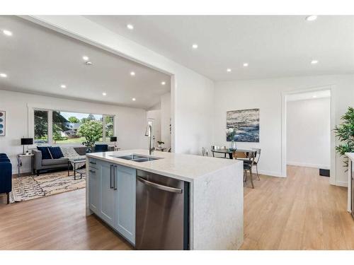 78 Gloucester Crescent Sw, Calgary, AB - Indoor Photo Showing Kitchen With Double Sink