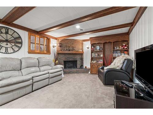 1123 14 Street Nw, Calgary, AB - Indoor Photo Showing Living Room With Fireplace