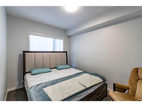 201-40 Carrington Plaza Nw, Calgary, AB - Indoor Photo Showing Bedroom