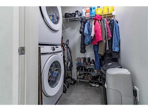 201-40 Carrington Plaza Nw, Calgary, AB - Indoor Photo Showing Laundry Room