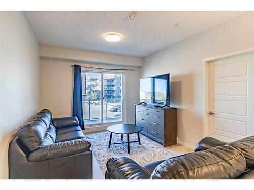 201-40 Carrington Plaza Nw, Calgary, AB - Indoor Photo Showing Living Room