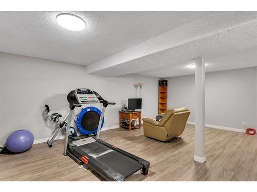 3303 42 Street Ne, Calgary, AB - Indoor Photo Showing Gym Room
