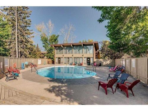 410-816 89 Avenue Sw, Calgary, AB - Outdoor With In Ground Pool With Backyard