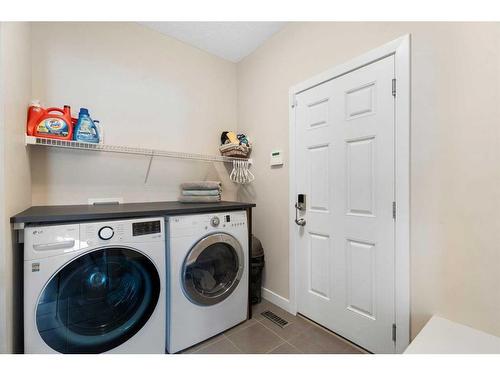 23 Brightoncrest Common Se, Calgary, AB - Indoor Photo Showing Laundry Room