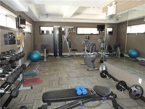 240-23 Millrise Drive Sw, Calgary, AB - Indoor Photo Showing Gym Room