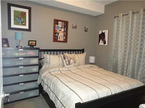 240-23 Millrise Drive Sw, Calgary, AB - Indoor Photo Showing Bedroom