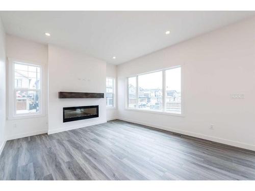 7 Homestead Passage Ne, Calgary, AB - Indoor Photo Showing Living Room With Fireplace