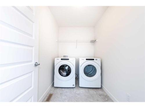 7 Homestead Passage Ne, Calgary, AB - Indoor Photo Showing Laundry Room