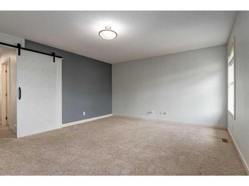 75 Evansview Point Nw, Calgary, AB - Indoor Photo Showing Other Room